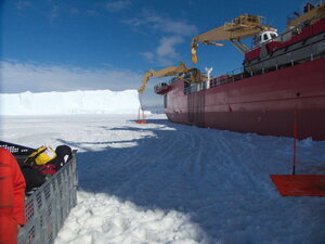If you want to offload a ship, you do it like this: one ship, one crane and a coordination of people and vehicles to bring several hundred tons of cargo onto the ice shelf. The dingy is what we have to jump into if we hear a crack (though I should be clear, that's not likely!)