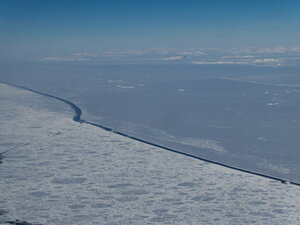 More coastal ice with the actual continent in the background.
