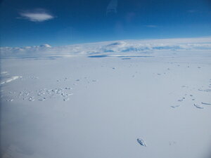 Flying over the signficant sea ice towards Alexander Island at the base of the Antarctic peninsula.