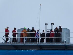 The raising of the flag by the open-up team.